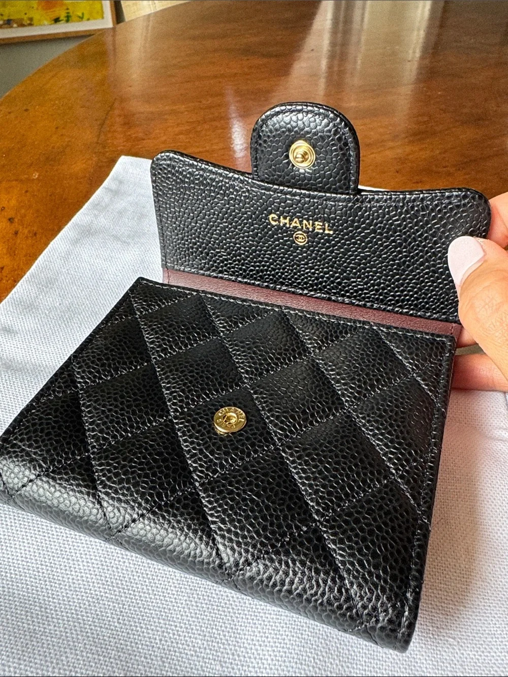 CHANEL Black Quilted Caviar Leather Wallet with Gold CC
